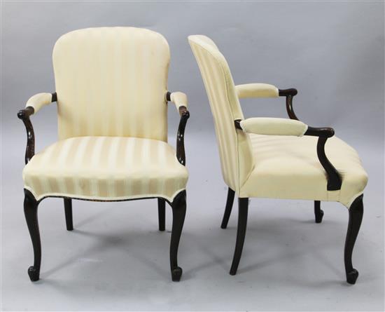 A pair of Hepplewhite style mahogany elbow chairs, H.2ft 11in.
